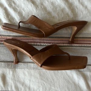 Light brown 3” heeled square toed sandals. Like new.